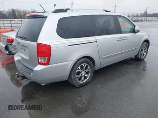 2014 Kia Sedona EX with VIN KNDMH4C76E6541200, listed as a IAAI auction lot 41657002 with 141,377 mi miles. Bid and sale history available at carsss.com. Image 4.