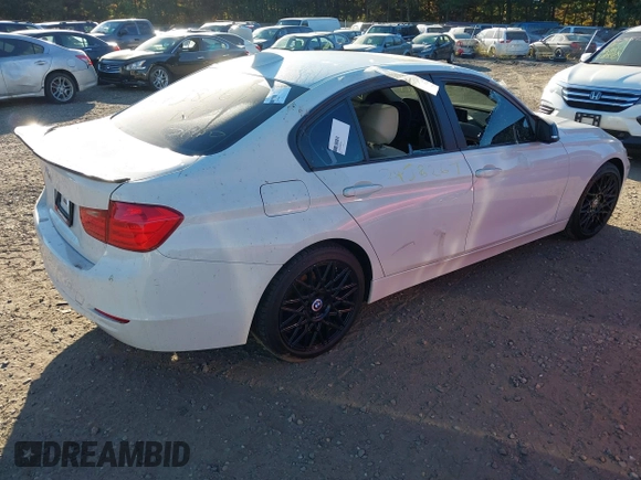 2014 BMW 3 Series 320i xDrive with VIN WBA3C3G51ENR25045, listed as a IAAI auction lot 40615577 with 150,046 mi miles. Bid and sale history available at carsss.com. Image 4.