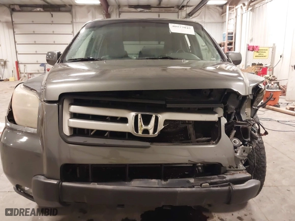 2007 Honda Pilot EX-L with VIN 2HKYF187X7H528523, listed as a IAAI auction lot 40977045 with 139,463 mi miles. Bid and sale history available at carsss.com. Image 13.