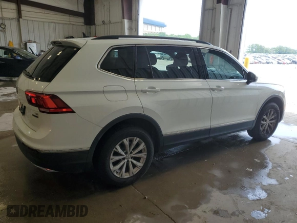 2018 Volkswagen Tiguan SEL z VIN 3VV2B7AX9JM182885, wystawiony jako Copart lot #60194295 z przebiegiem 101 861 mil mil oraz Czysty tytuł • Clean title. Historia ofert i sprzedaży dostępna na DreamBid. Obrazek 3.