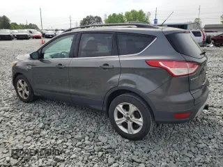 2015 Ford Escape SE with VIN 1FMCU9G94FUA91796, listed as a Copart auction lot 53605895 with 165,353 mi miles and Salvage Title. Bid and sale history available at DreamBid. Image 2.