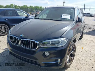 2014 BMW X5 xDrive35d with VIN 5UXKS4C57E0J93982, listed as a IAAI auction lot 42085173 with 169,908 mi miles. Bid and sale history available at carsss.com. Image 21.