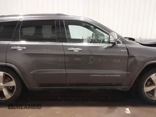 2015 Jeep Grand Cherokee Overland z VIN 1C4RJFCG1FC663469, wystawiony jako IAAI lot #41666113 z przebiegiem 140 159 mil mil oraz . Historia ofert i sprzedaży dostępna na DreamBid. Obrazek 13.