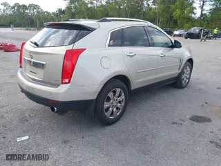 2014 Cadillac SRX Luxury Collection with VIN 3GYFNBE34ES566697, listed as a IAAI auction lot 41690934 with 85,757 mi miles. Bid and sale history available at carsss.com. Image 4.