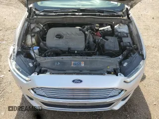 2016 Ford Fusion SE z VIN 3FA6P0HDXGR369218, wystawiony jako Copart lot #61225875 z przebiegiem 176 559 mil mil oraz Szkoda całkowita • Salvage title. Historia ofert i sprzedaży dostępna na DreamBid. Obrazek 11.