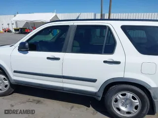 2005 Honda CR-V LX with VIN JHLRD68585C002800, listed as a IAAI auction lot 41939797 with 194,319 mi miles. Bid and sale history available at carsss.com. Image 14.