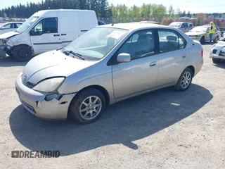 2003 Toyota Prius with VIN JT2BK18U630086718, listed as a IAAI auction lot 42036644 with 251,852 mi miles. Bid and sale history available at carsss.com. Image 2.