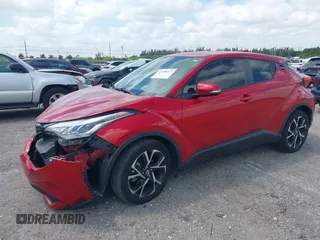 2022 Toyota C-HR XLE z VIN NMTKHMBX4NR141627, wystawiony jako IAAI lot #42108475 z przebiegiem 49 564 mil mil oraz . Historia ofert i sprzedaży dostępna na DreamBid. Obrazek 2.