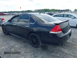 2014 Chevrolet Impala LTZ with VIN 2G1WC5E31E1111954, listed as a IAAI auction lot 42159562 with 203,496 mi miles and . Bid and sale history available at DreamBid. Image 3.