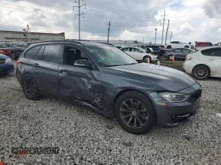2014 BMW 3 Series 328d xDrive with VIN WBA3K5C59EKT33205, listed as a Copart auction lot 65216574 with 202,927 mi miles and Salvage title. Bid and sale history available at DreamBid. Image 4.