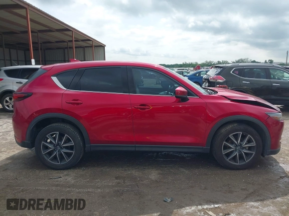 2018 Mazda CX-5 Grand Touring with VIN JM3KFADM7J1357401, listed as a IAAI auction lot 42106012 with 119,420 mi miles and . Bid and sale history available at DreamBid. Image 13.