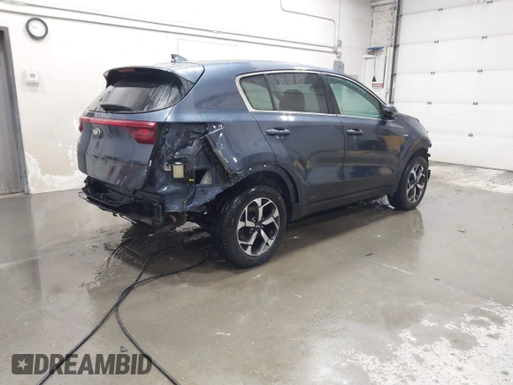 2021 Kia Sportage LX with VIN KNDPMCAC2M7877132, listed as a IAAI auction lot 41443934 with 9,528 mi miles and . Bid and sale history available at carsss.com. Image 4.