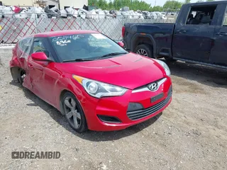 2012 Hyundai Veloster w/Gray Int z VIN KMHTC6AD8CU019848, wystawiony jako IAAI lot #42392772 z przebiegiem 118 463 mil mil oraz . Historia ofert i sprzedaży dostępna na DreamBid. Obrazek 1.