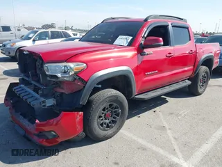 2018 Toyota Tacoma SR5 with VIN 3TMAZ5CN2JM067292, listed as a IAAI auction lot 41851959 with 70,988 mi miles and . Bid and sale history available at DreamBid. Image 18.