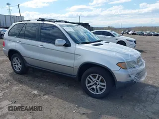 2006 BMW X5 3.0i with VIN 5UXFA13596LY41387, listed as a IAAI auction lot 42039140 with 169,696 mi miles. Bid and sale history available at carsss.com. Image 1.