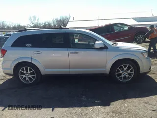 2011 Dodge Journey Mainstreet with VIN 3D4PG1FG5BT540585, listed as a IAAI auction lot 41852964 with 156,941 mi miles and . Bid and sale history available at carsss.com. Image 13.