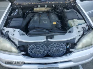 2000 Mercedes-Benz M 320/430/500 with VIN 4JGAB72E0YA167962, listed as a Copart auction lot 89158575 with 194,471 mi miles and Salvage title. Bid and sale history available at DreamBid. Image 12.