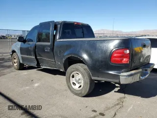 2002 Ford F-150 XLT with VIN 1FTRW07682KB94008, listed as a Copart auction lot 88724185 with 231,464 mi miles and Salvage Title. Bid and sale history available at carsss.com. Image 2.