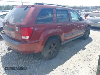 2007 Jeep Grand Cherokee Laredo with VIN 1J8GR48K57C618529, listed as a IAAI auction lot 42139566 with 174,559 mi miles. Bid and sale history available at carsss.com. Image 4.