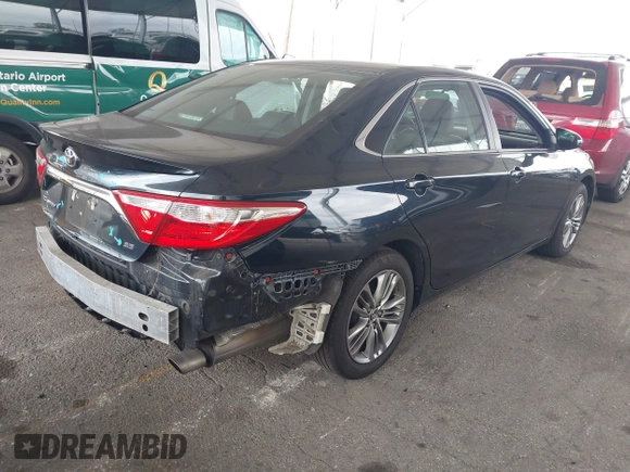2015 Toyota Camry XLE with VIN 4T1BF1FK5FU996477, listed as a IAAI auction lot 42051830 with 102,226 mi miles. Bid and sale history available at carsss.com. Image 4.