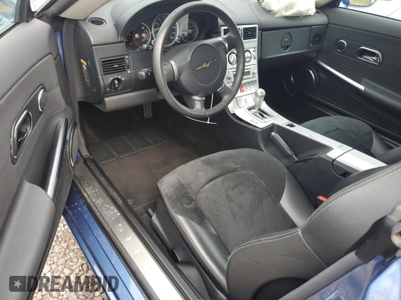2005 Chrysler Crossfire z VIN 1C3AN79N65X044701, wystawiony jako Copart lot #72050804 z przebiegiem 44 783 mil mil oraz Szkody całkowita. Historia ofert i sprzedaży dostępna na DreamBid. Obrazek 8.