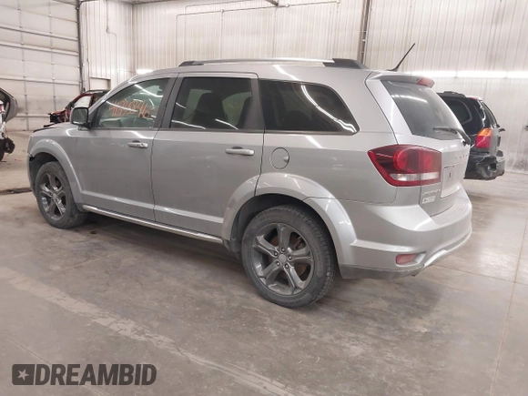 2015 Dodge Journey Crossroad with VIN 3C4PDCGG8FT631064, listed as a IAAI auction lot 41235846 with 127,718 mi miles and . Bid and sale history available at DreamBid. Image 3.