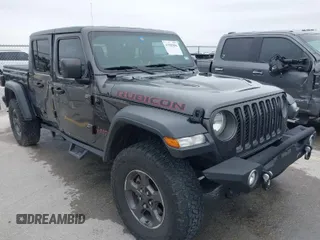 2020 Jeep Gladiator Rubicon with VIN 1C6JJTBG8LL135573, listed as a IAAI auction lot 41585896 with 79,070 mi miles and . Bid and sale history available at DreamBid. Image 1.