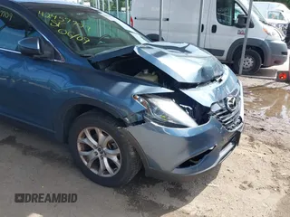 2014 Mazda CX-9 Touring with VIN JM3TB3CV7E0440747, listed as a IAAI auction lot 42457709 with 166,588 mi miles and . Bid and sale history available at DreamBid. Image 17.