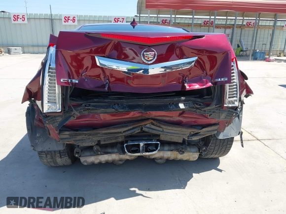 2014 Cadillac CTS Premium with VIN 1G6DD1E35E0179287, listed as a IAAI auction lot 41975243 with 92,851 mi miles and . Bid and sale history available at DreamBid. Image 6.