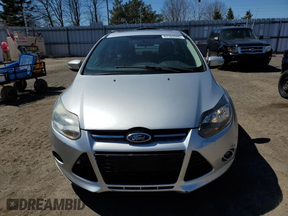 2013 Ford Focus Titanium with VIN 1FADP3J24DL327770, listed as a Copart auction lot 47582605 with 140,710 mi miles and Salvage Title. Bid and sale history available at carsss.com. Image 5.