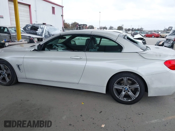 2015 BMW 4 Series 428i with VIN WBA3V7C5XFP772663, listed as a IAAI auction lot 42101012 with 75,901 mi miles and . Bid and sale history available at DreamBid. Image 14.