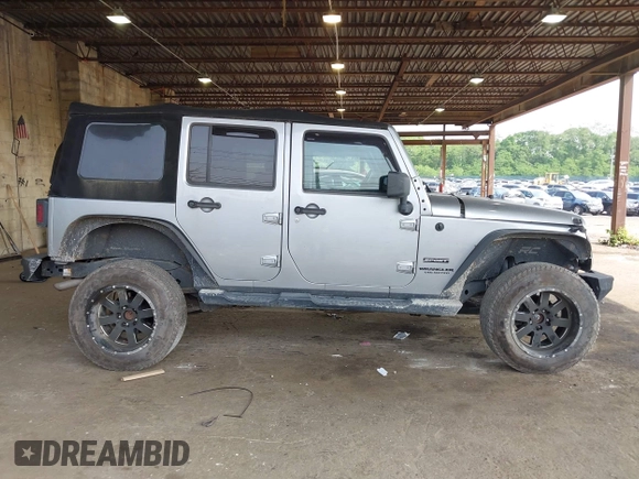 2017 Jeep Wrangler Unlimited Sport with VIN 1C4BJWDG1HL591515, listed as a IAAI auction lot 42426201 with 124,131 mi miles and . Bid and sale history available at DreamBid. Image 13.