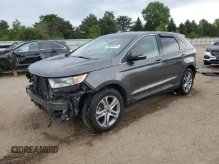 2017 Ford Edge Titanium z VIN 2FMPK3K94HBB80451, wystawiony jako Copart lot #58923515 z przebiegiem 82 138 mil mil oraz Szkoda całkowita • Salvage title. Historia ofert i sprzedaży dostępna na DreamBid. Obrazek 1.
