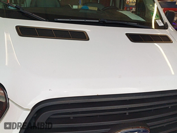 2016 Ford Transit Cargo z VIN 1FTYE1YM3GKB15532, wystawiony jako IAAI lot #42788480 z przebiegiem 64 600 mil mil oraz . Historia ofert i sprzedaży dostępna na DreamBid. Obrazek 27.