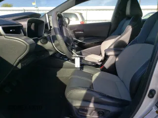 2021 Toyota Corolla Hatchback XSE with VIN JTNA4MBE6M3125836, listed as a Copart auction lot 73800704 with 56,394 mi miles and Salvage Title. Bid and sale history available at carsss.com. Image 7.