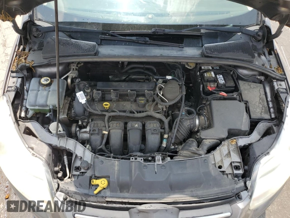 2012 Ford Focus SE z VIN 1FAHP3F22CL431070, wystawiony jako Copart lot #59569925 z przebiegiem 222 295 mil mil oraz Szkoda całkowita • Salvage title. Historia ofert i sprzedaży dostępna na DreamBid. Obrazek 11.
