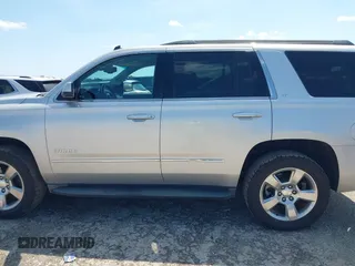 2015 Chevrolet Tahoe LT with VIN 1GNSCBKC9FR223426, listed as a IAAI auction lot 42352698 with 128,339 mi miles and . Bid and sale history available at DreamBid. Image 14.
