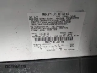 2015 Ford Taurus SEL z VIN 1FAHP2E81FG105404, wystawiony jako IAAI lot #40888773 z przebiegiem Nie podano mil oraz . Historia ofert i sprzedaży dostępna na DreamBid. Obrazek 9.