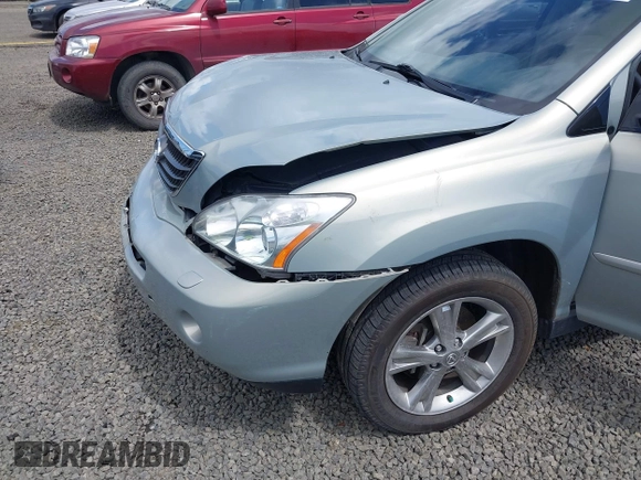 2006 Lexus RX 400h z VIN JTJHW31U860010706, wystawiony jako IAAI lot #42286504 z przebiegiem 220 671 mil mil oraz . Historia ofert i sprzedaży dostępna na DreamBid. Obrazek 16.