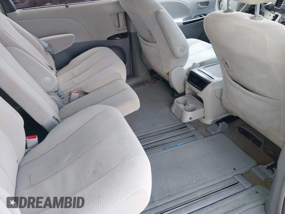 2013 Toyota Sienna LE AAS with VIN 5TDKK3DC4DS399295, listed as a IAAI auction lot 42173970 with 128,350 mi miles and . Bid and sale history available at DreamBid. Image 8.