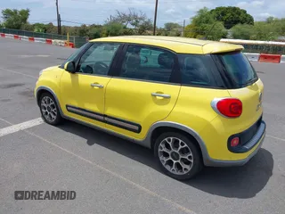 2014 FIAT 500L Trekking with VIN ZFBCFADH7EZ020527, listed as a IAAI auction lot 42193698 with 21,771 mi miles and . Bid and sale history available at DreamBid. Image 3.