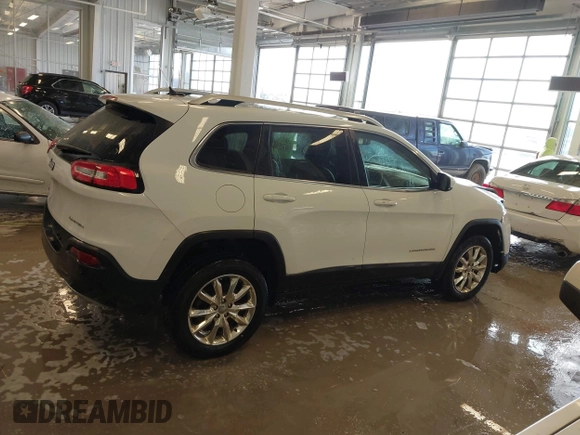 2015 Jeep Cherokee Limited with VIN 1C4PJMDS2FW682142, listed as a IAAI auction lot 41399903 with 124,918 mi miles and . Bid and sale history available at DreamBid. Image 14.