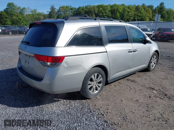 2014 Honda Odyssey EX-L with VIN 5FNRL5H61EB128311, listed as a IAAI auction lot 42334932 with 270,135 mi miles and . Bid and sale history available at DreamBid. Image 4.