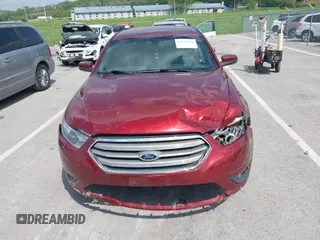 2014 Ford Taurus SEL z VIN 1FAHP2E82EG157445, wystawiony jako IAAI lot #42133676 z przebiegiem 174 616 mil mil oraz . Historia ofert i sprzedaży dostępna na DreamBid. Obrazek 11.