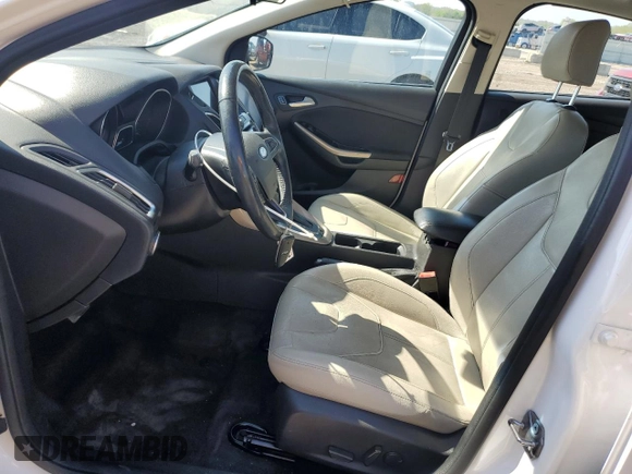 2018 Ford Focus Titanium with VIN 1FADP3J21JL294061, listed as a Copart auction lot 53827375 with 194,577 mi miles and Salvage title. Bid and sale history available at DreamBid. Image 7.