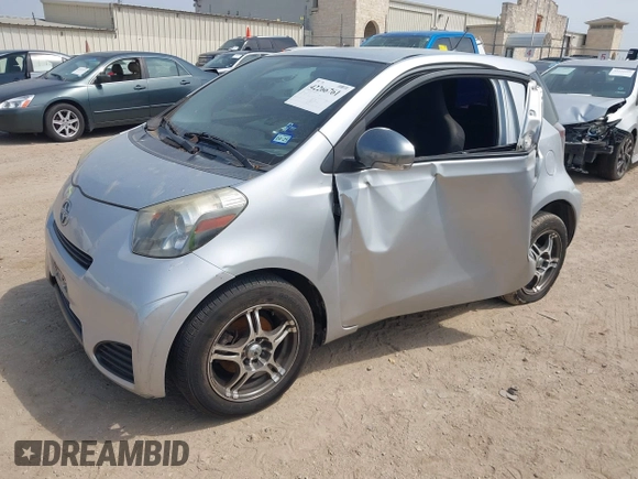 2012 Scion iQ with VIN JTNJJXB02CJ015746, listed as a IAAI auction lot 42266761 with 135,321 mi miles and . Bid and sale history available at DreamBid. Image 2.