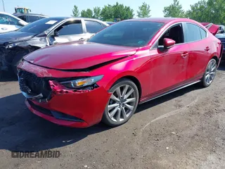 2022 Mazda 3 Select with VIN 3MZBPABLXNM315231, listed as a IAAI auction lot 42522045 with 17,486 mi miles and . Bid and sale history available at DreamBid. Image 2.