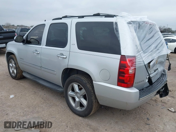 2014 Chevrolet Tahoe LTZ z VIN 1GNSCCE04ER159110, wystawiony jako IAAI lot #41615653 z przebiegiem 171 422 mil mil oraz . Historia ofert i sprzedaży dostępna na DreamBid. Obrazek 3.