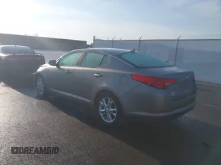 2013 Kia Optima EX with VIN 5XXGN4A77DG101902, listed as a IAAI auction lot 42001996 with 143,469 mi miles and . Bid and sale history available at DreamBid. Image 3.