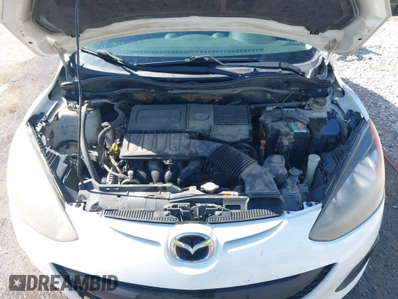 2014 Mazda 2 Sport with VIN JM1DE1KY0E0175562, listed as a IAAI auction lot 42023803 with 247,411 mi miles and . Bid and sale history available at carsss.com. Image 10.
